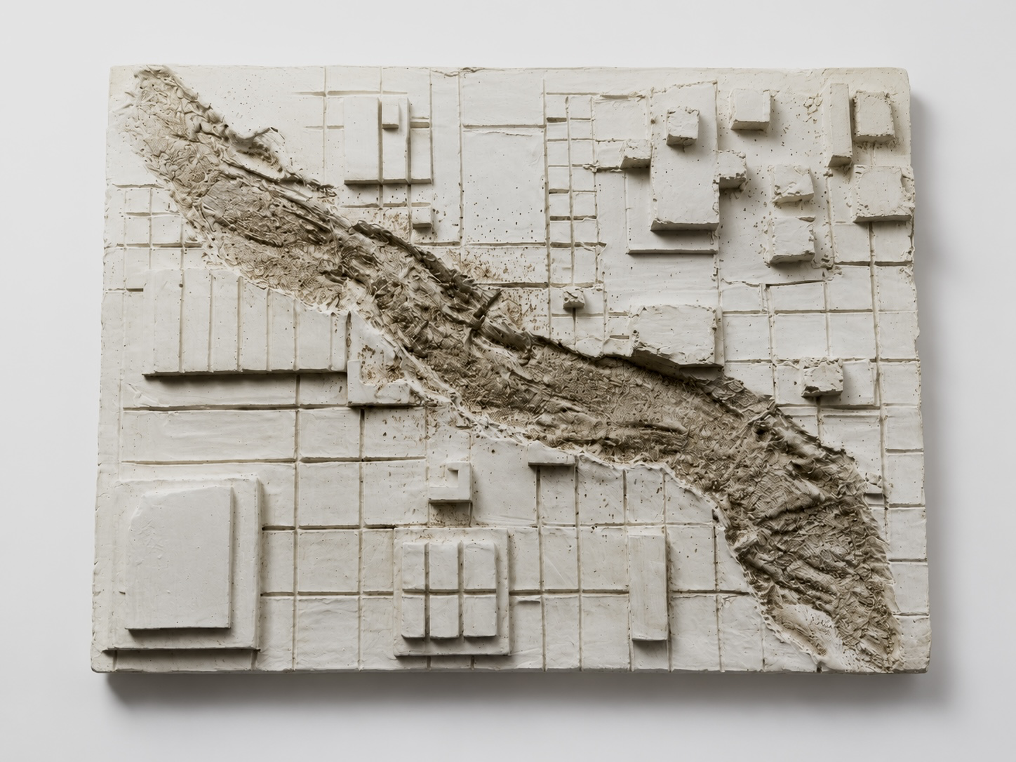 System Underfoot plaster relief sculpture